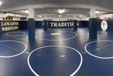Custom Wrestling Room with Roll-Out Wall Padding and Column Pads